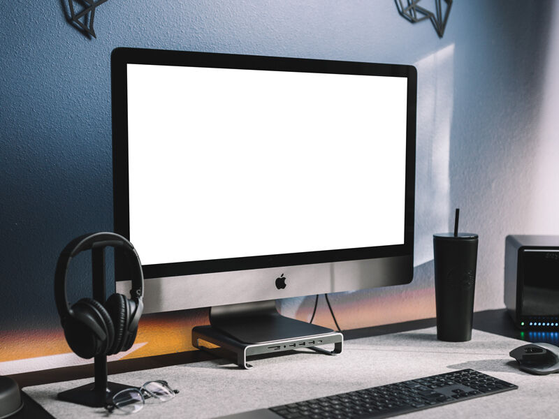 Perspective View of Modern Workstation iMac Mockup in Lifelike Setting FREE PSD
