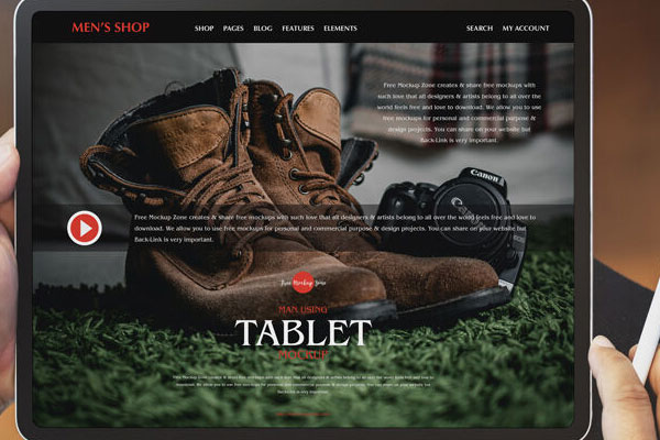 Top View of a Tablet in a Man's Hands Mockup FREE PSD