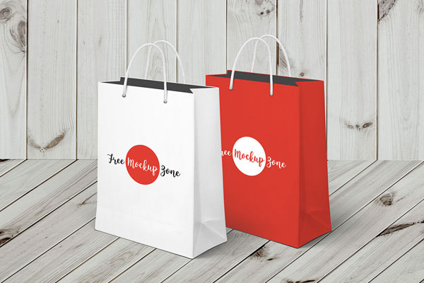 Two Vertical Plastic Shopping Bags with a Wooden Background Mockup FREE PSD