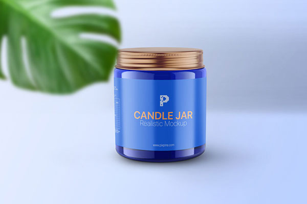 Vertical Candle Jar and Lid Mockup with a Large Leaf FREE PSD