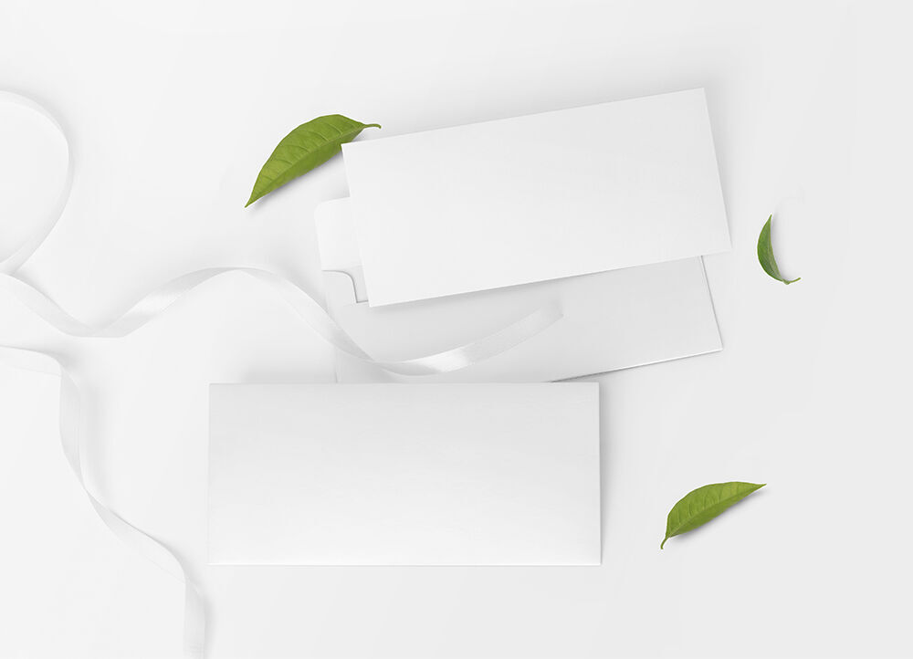 Wedding Invitation Card and Envelope Mockup with Ribbon and Leaves FREE PSD
