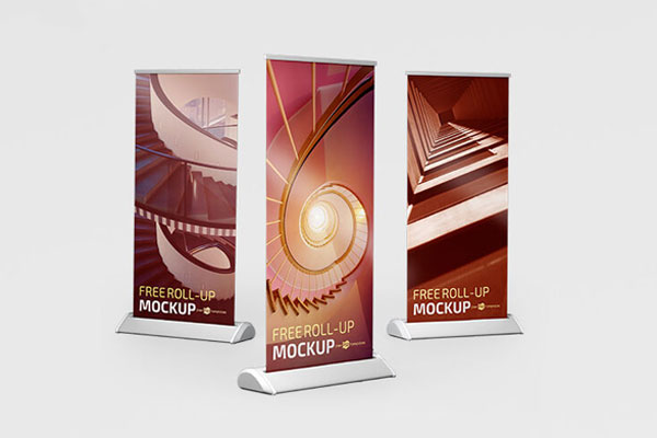 2 Mockups Featuring Roll Up Banners in Different Views FREE PSD