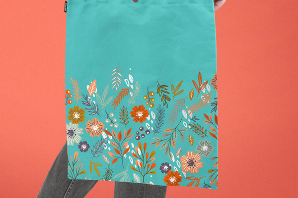 A Tote Bag in a Person's Hand Mockup FREE PSD