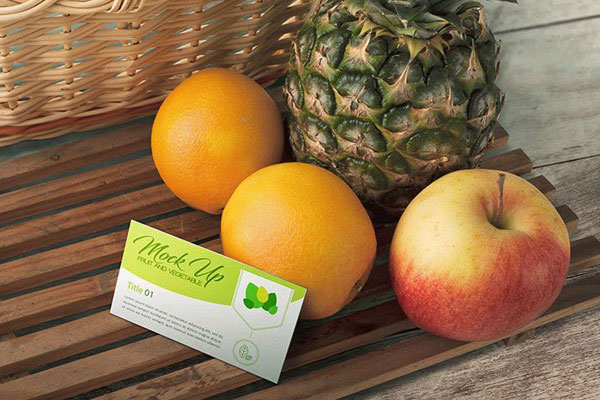 Business Card Mockup with Oranges, Apple, and Pineapple FREE PSD