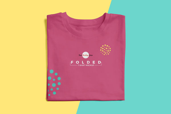 Folded T-shirt Placed in the Top View Mockup FREE PSD