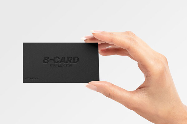 Front View of a Business Card Held Up by a Hand Mockup FREE PSD