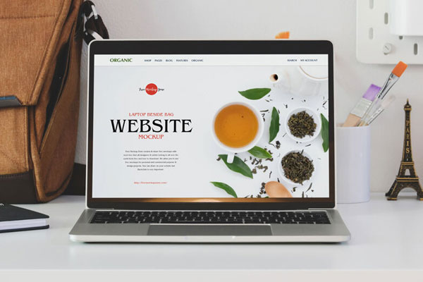 Front View of a Laptop Mockup in Realistic Setting FREE PSD