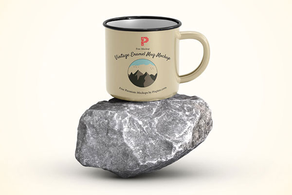 Front View of Enamel Mug on Piece of Rock Mockup FREE PSD