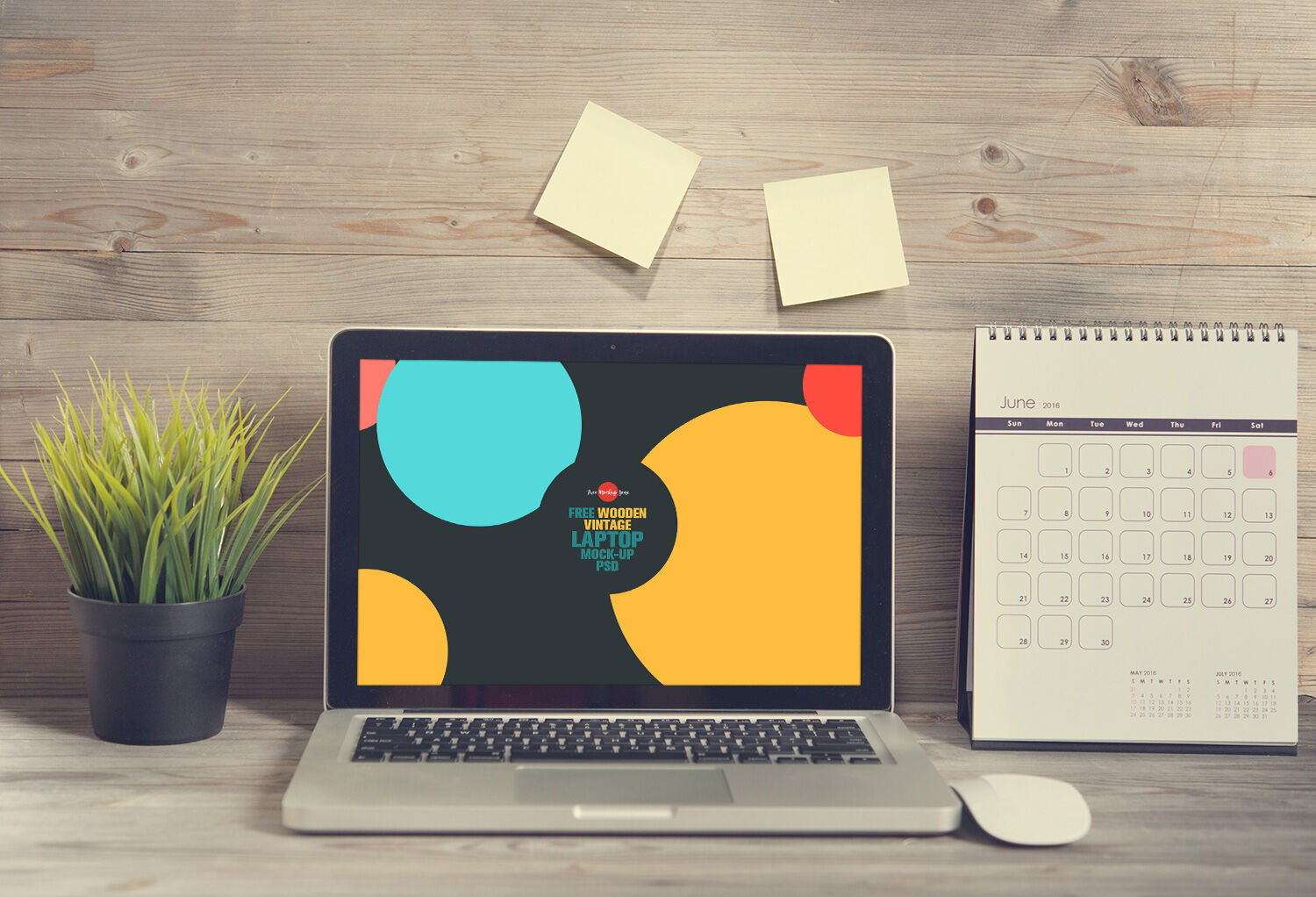 Laptop Opened on a Wooden Desk in Front View Mockup FREE PSD
