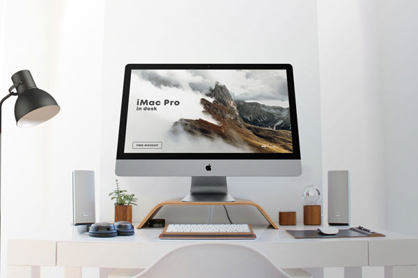 Low-Angle Shot of an iMac Pro on Desk Mockup FREE PSD