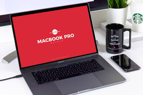 Macbook Pro with Cellphone Mockup in Workplace FREE PSD