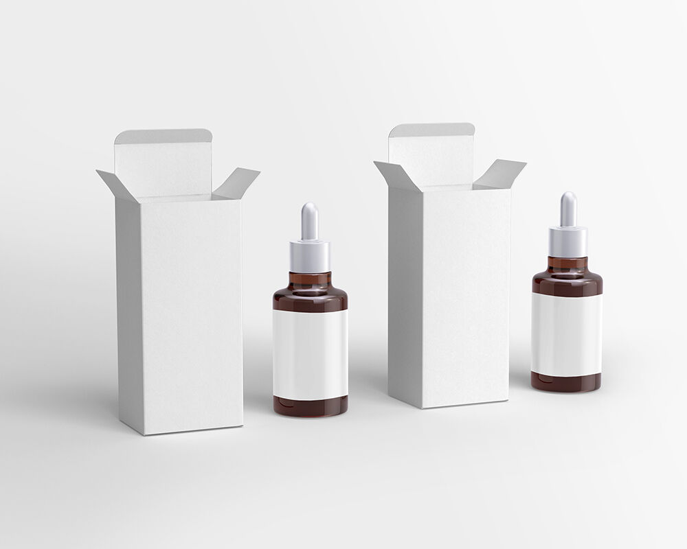 Mockup Featuring Two Dropper Bottles Standing with Two Boxes FREE PSD