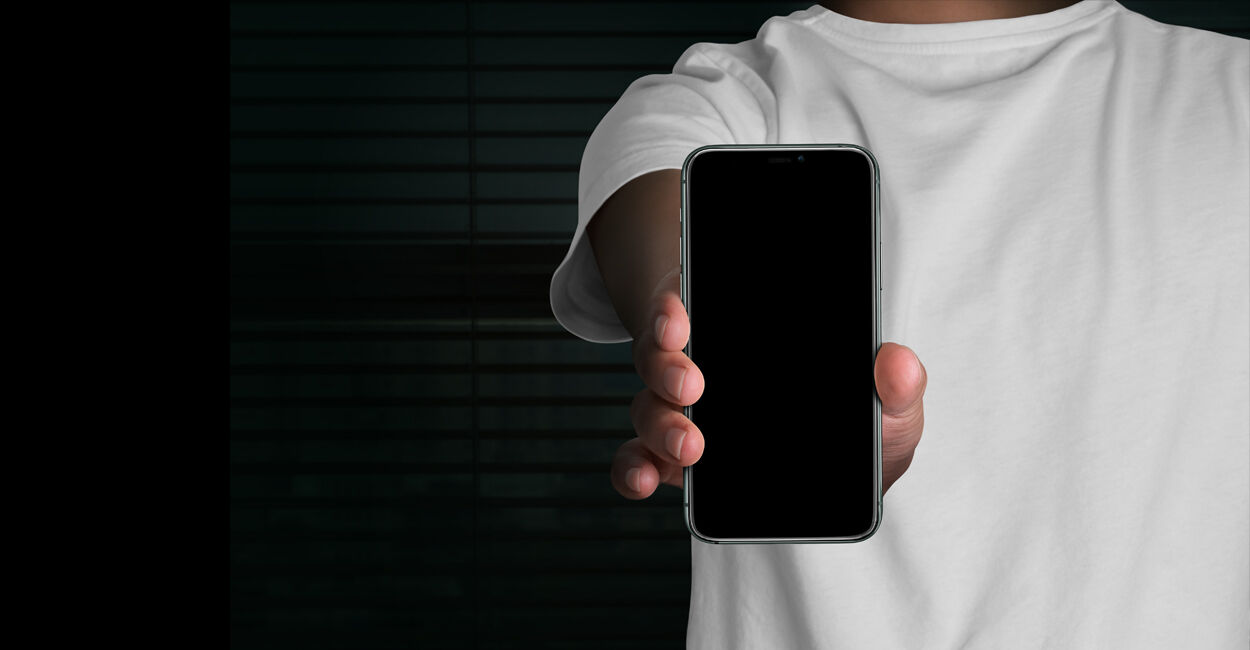 Mockup of iPhone 11 Pro in a Person's Hand FREE PSD