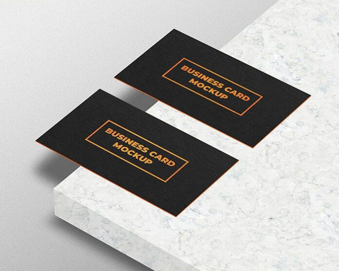 Mockup of Two Business Cards Laid in Perspective FREE PSD