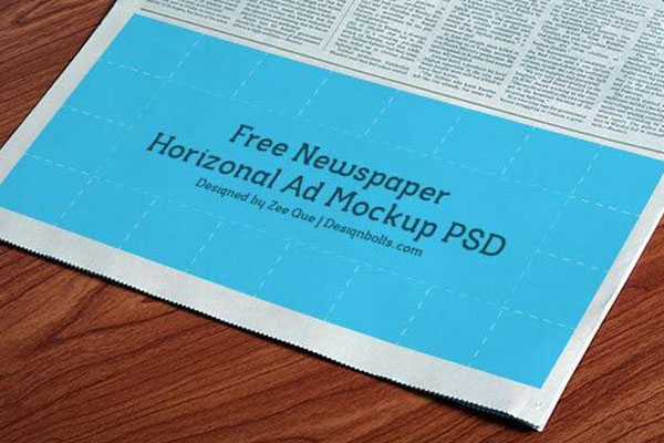 Perspective View of a Horizontal Newspaper Ad Mockup FREE PSD