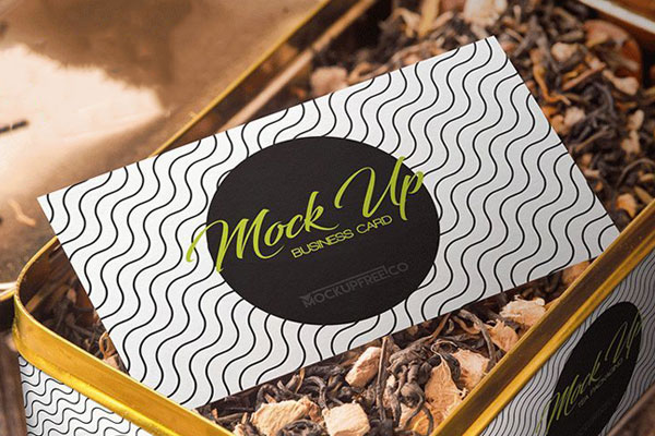 Perspective View of a Tea Packaging and Business Card Mockup FREE PSD