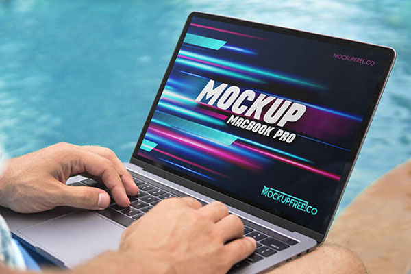 Perspective View of MacBook Pro Mockup FREE PSD