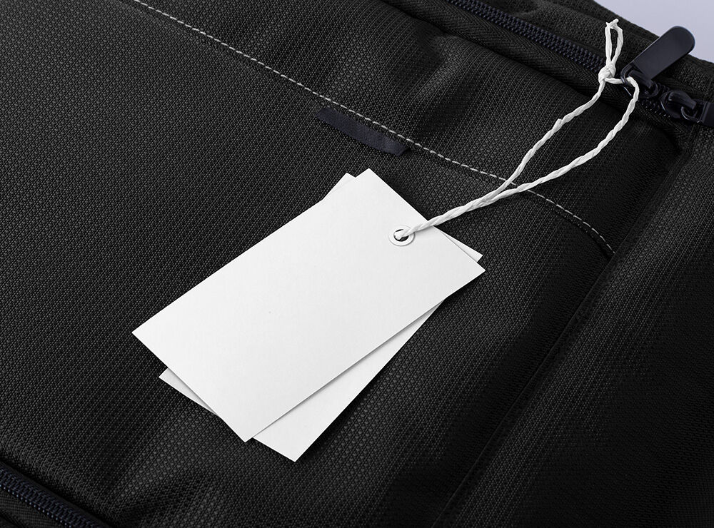Perspective View of Two Tags Hanging Off a Bag Mockup FREE PSD