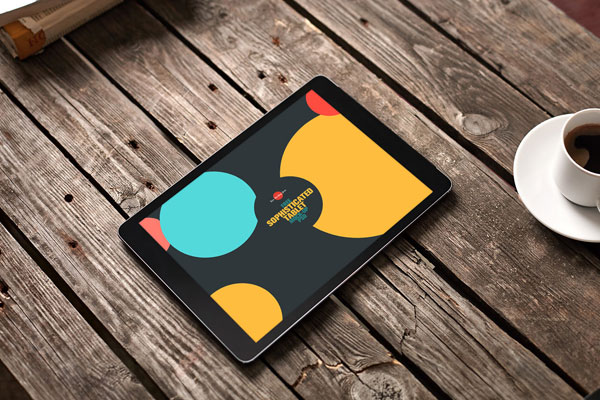 Perspective View Tablet Mockup with a Cup of Coffee FREE PSD