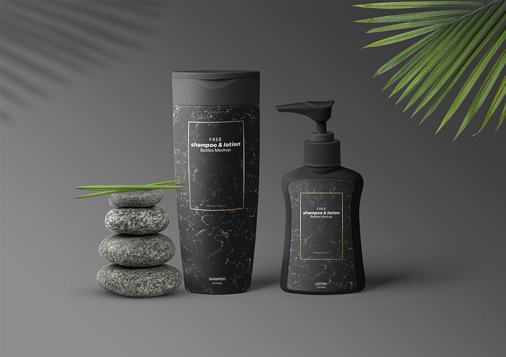 Shampoo and Lotion Bottle Mockup with Leaves and Stones FREE PSD