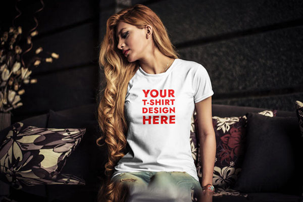 T-shirt Mockup of Young Woman Sitting on Sofa FREE PSD