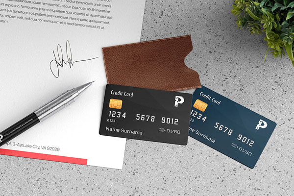 Top View Mockup of Two Credit Cards with Leather Holder FREE PSD