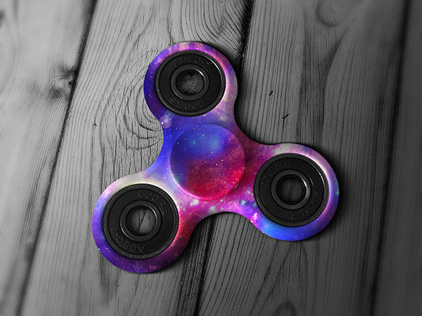 Tri-Fidget Spinner on a Wooden Surface Mockup FREE PSD