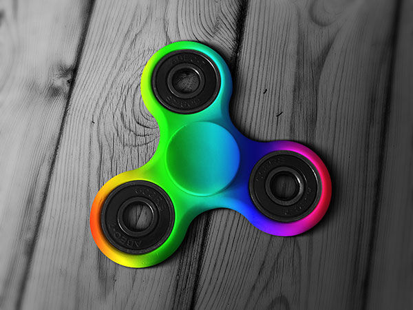 Tri-Fidget Spinner on a Wooden Surface Mockup FREE PSD