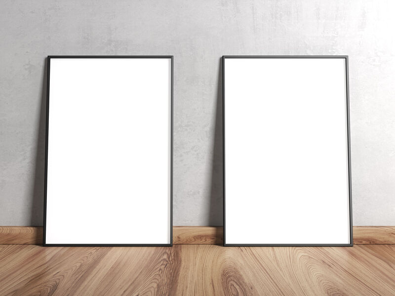 Two Framed Posters on Wooden Floor Leaning Against Wall Mockup FREE PSD