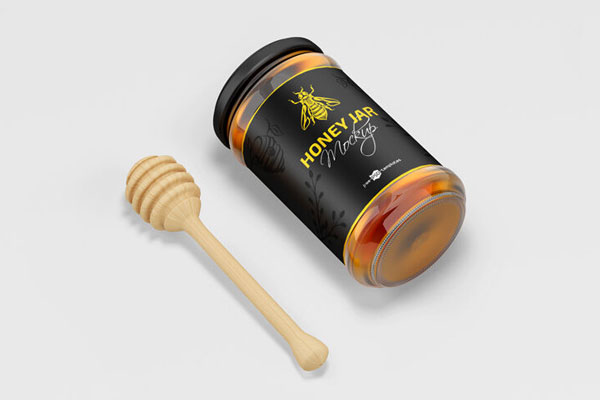 2 Mockups of Glass Honey Jar with Wooden Dipper FREE PSD