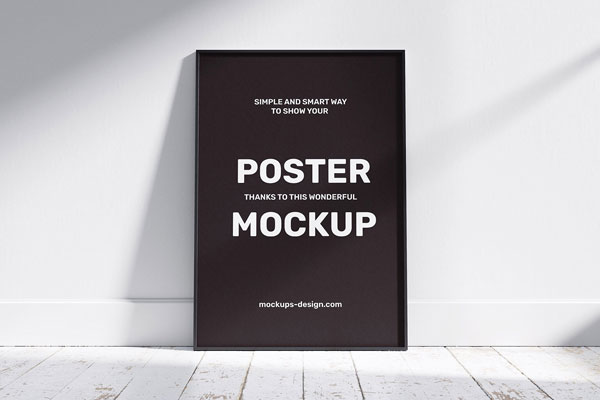 2 Poster Frame Mockups Laid on the Wall FREE PSD