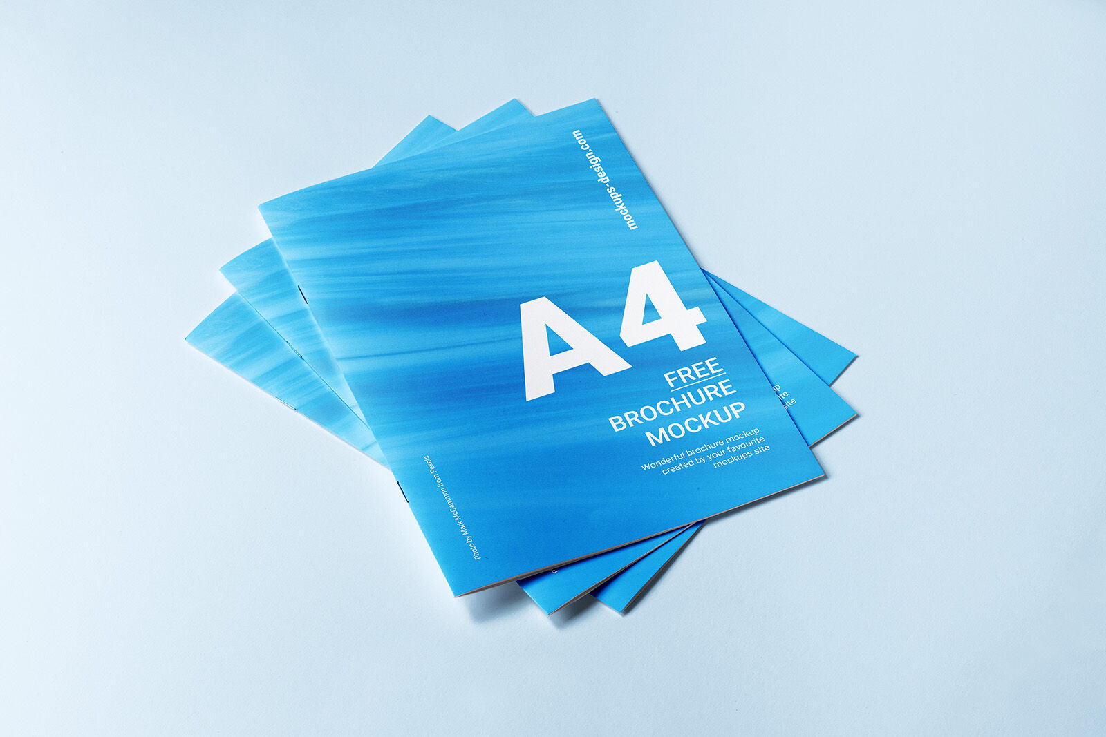 3 Mockups Including 3 Closed A4 Brochures in Different Positions FREE PSD