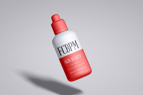 Dispensing Cosmetic Bottle Floating at an Angle in Front View Mockup FREE PSD