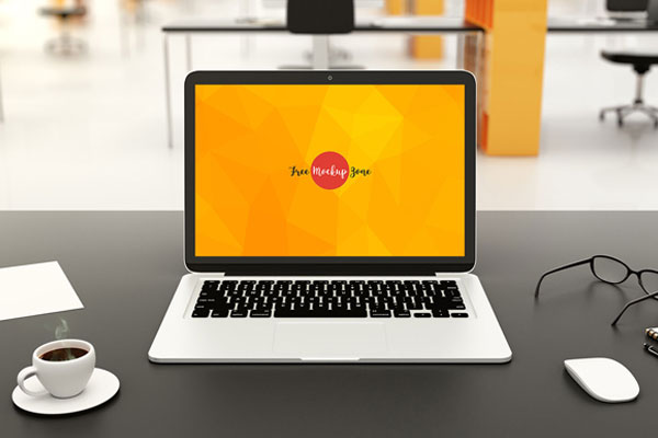 Front View of a Laptop on Professional Workstation Mockup FREE PSD