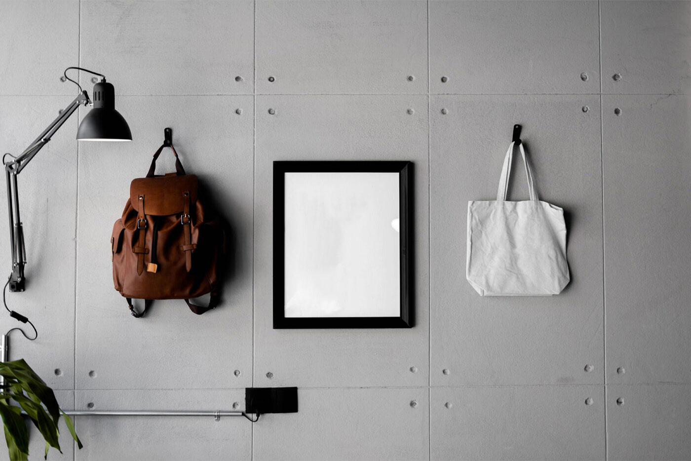 Front View of a Poster With Bag on a Wall Mockup FREE PSD