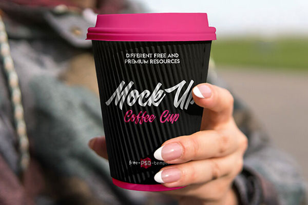 Front View Woman Holding Coffee Cup Mockup in Outdoors FREE PSD