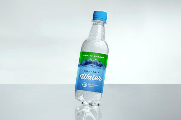 Mockup of a Leaning Small Water Bottle FREE PSD