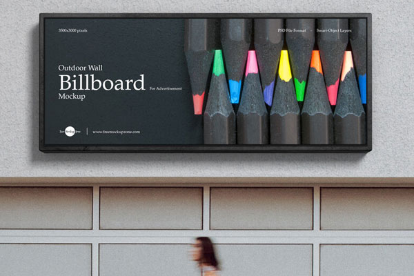 Outdoor Wall Billboard in the Front View Mockup Featuring a Woman Passing by FREE PSD