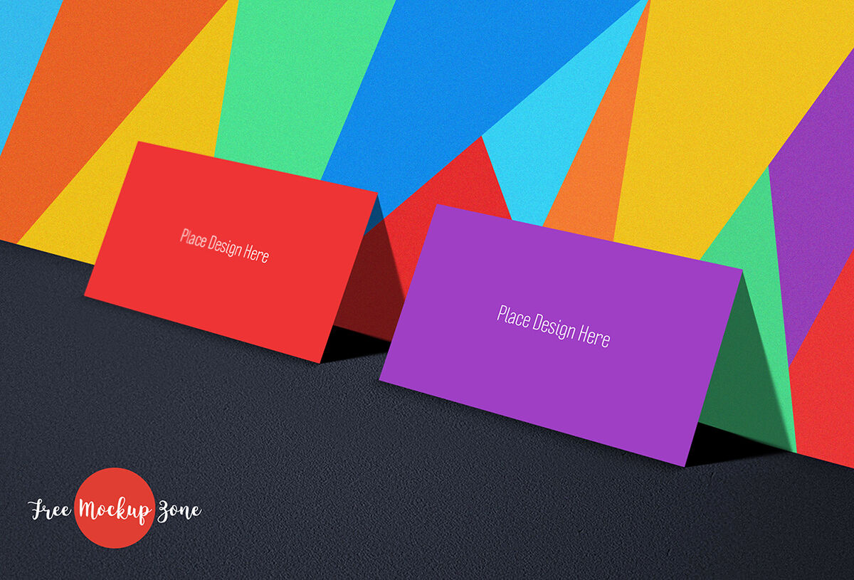Perspective View Business Cards Leaning to a Colorful Wall Mockup FREE PSD