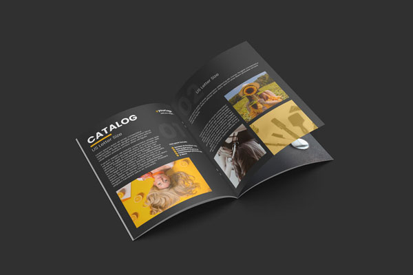 Perspective View of an Open Catalog Mockup with a Page Being Swiped FREE PSD