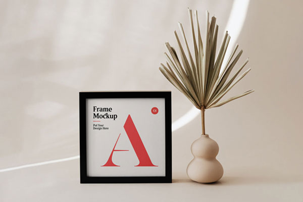 Small, Square Photo Frame Standing in the Front View Mockup FREE PSD