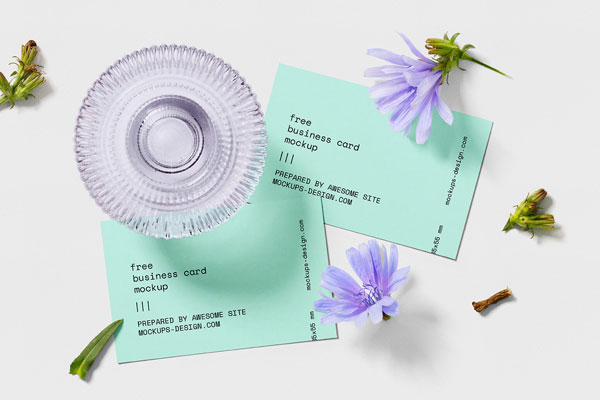 Top View of Two Business Cards Mockup with Flowers FREE PSD