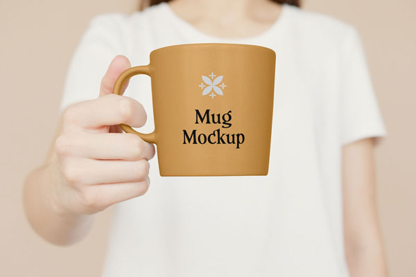 Women Holding a Mug in Front of Herself Mockup FREE PSD