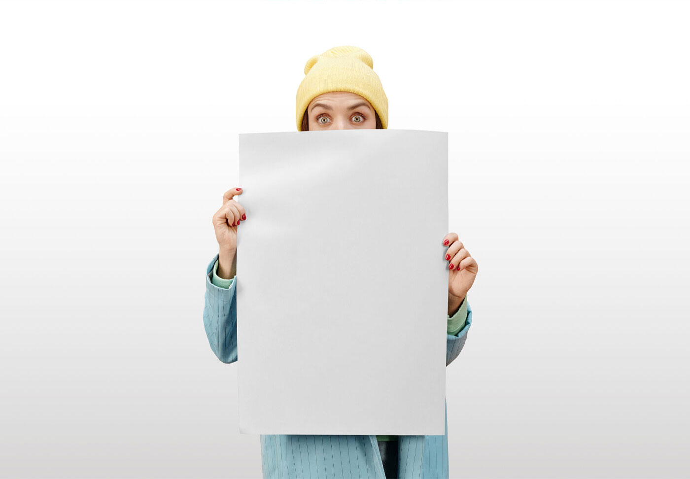 Women Holding a Poster in Front of Her Mockup FREE PSD