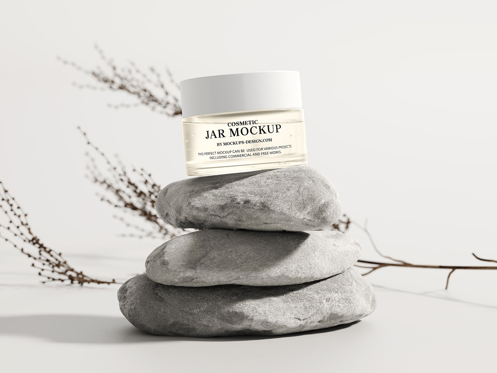 3 Cosmetic Jar Mockups Located on Stones FREE PSD