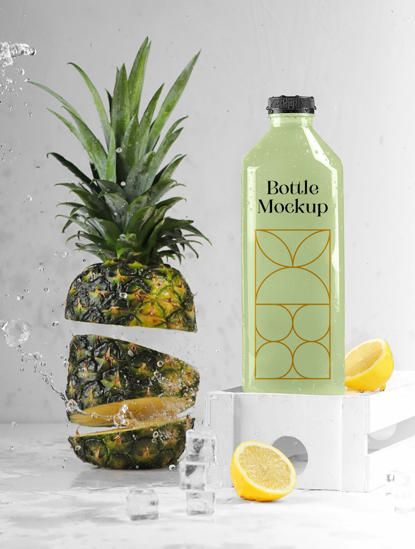 Bottle Mockup with Pineapple, Lemon, and Ice Cubes FREE PSD