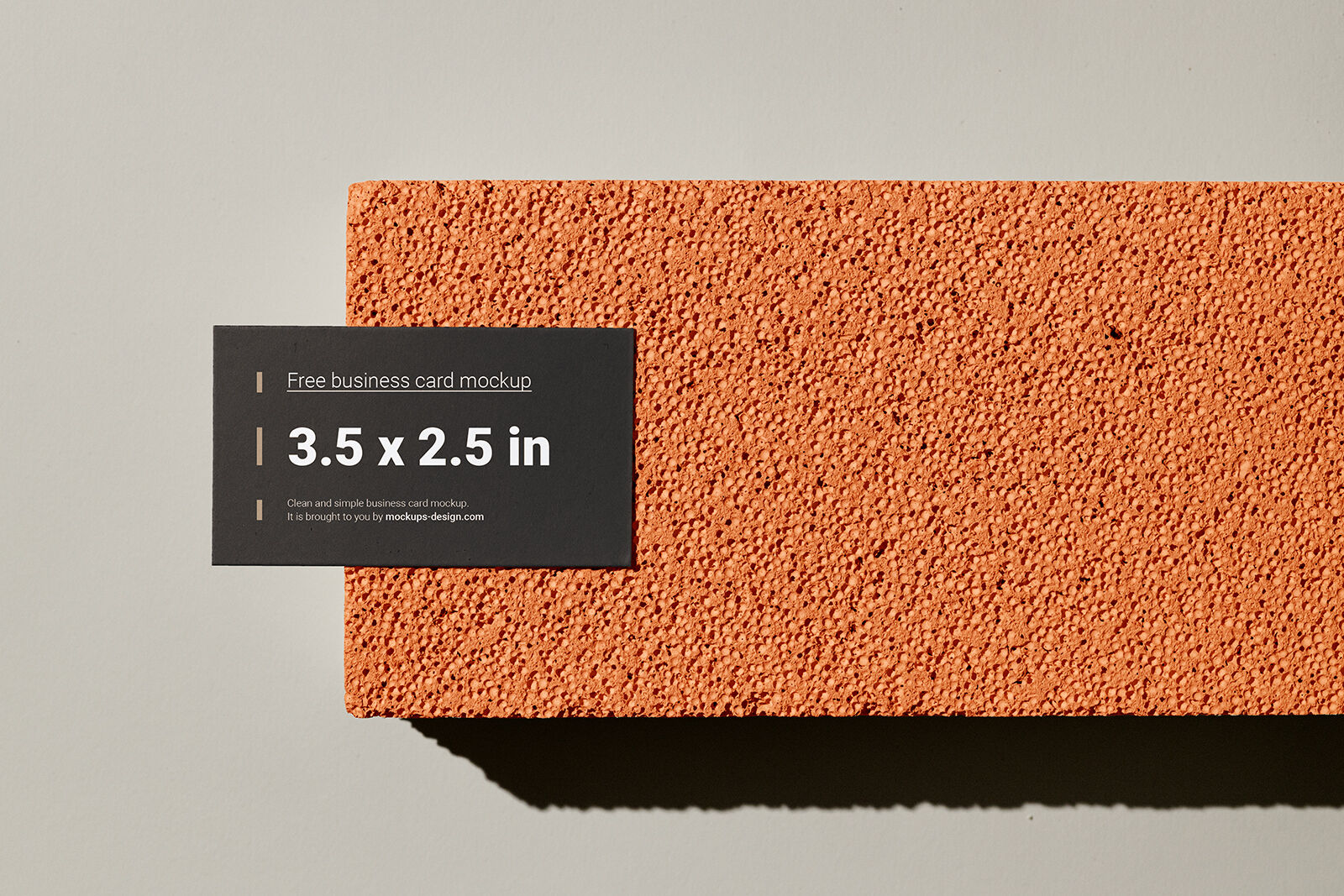 Business Card on The Edge of a Sponge Brick Mockup Free Download ...