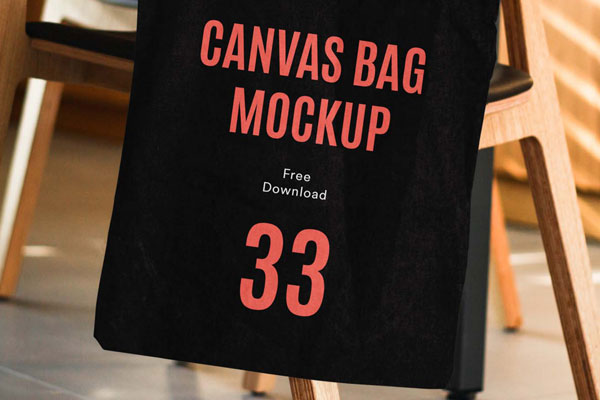 Canvas Bag Hanging On The Side Of A Wooden Chair Mockup FREE   Canvas Bag Hanging On The Side Of A Wooden Chair Mockup Thumbnail 