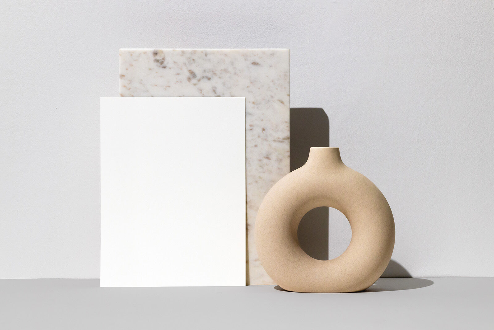 Front View Letter Flyer Leaning Against Marble Stone Mockup FREE PSD