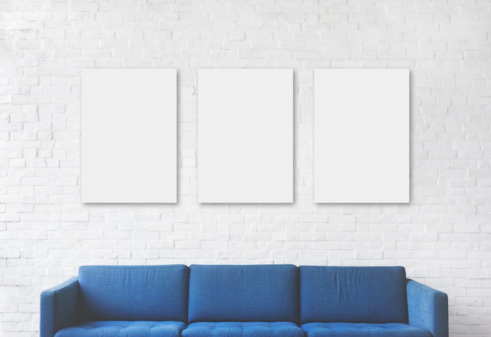Front View of Three Posters in Living Room Mockup FREE PSD